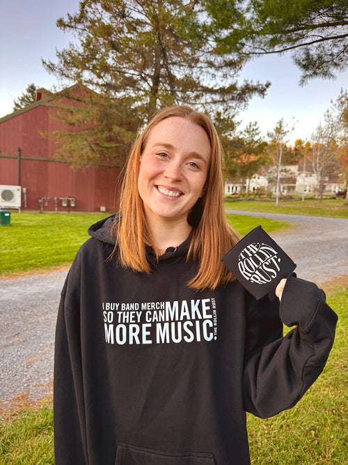 Rebecca wearing the black Make More Music hoodie with a koozie #color_Black
